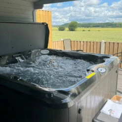 Jacuzzi® J235™ / J235IP™ - 6 Person Hot Tub With 1 Lounger 34 Jacuzzi® J235™ / J235IP™ - 6 Person Hot Tub With 1 Lounger -Outdoor Living Hottubs Shop J235MIDNIGHTDRIDTWOOD CustomerRowland3Square