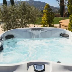 Jacuzzi® J485IP™ - 7 Person Hot Tub -Outdoor Living Hottubs Shop J485 Lifestyle 1