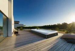 Jacuzzi® PowerActive™ J-19™ - 19ft Swim Spa -Outdoor Living Hottubs Shop JSS PowerActive J19 SmokedEbony Lifestyle 3000x2038 cb9e8a05 c738 4e3b b0dc f4ef1599e791